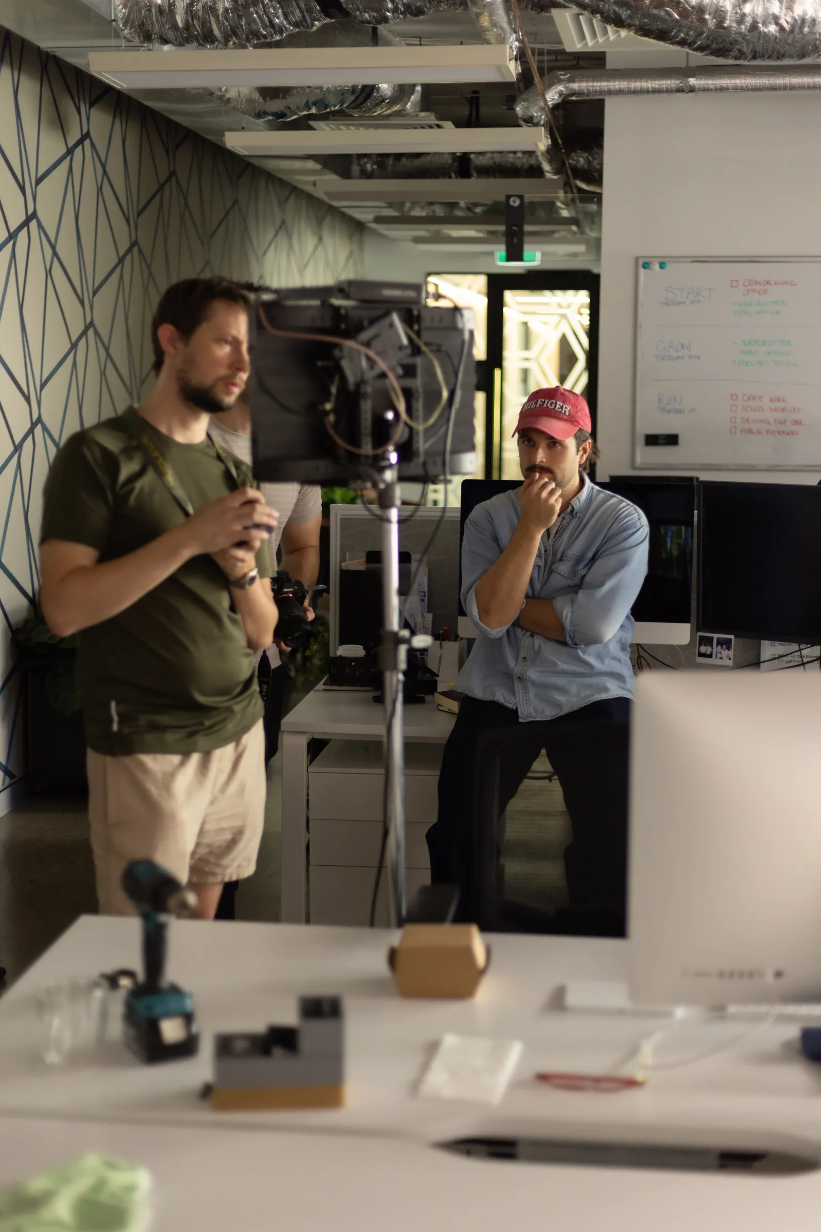 Matt from ShareStory watches closely while the final details of the set design are perfected for Xrecruiter.