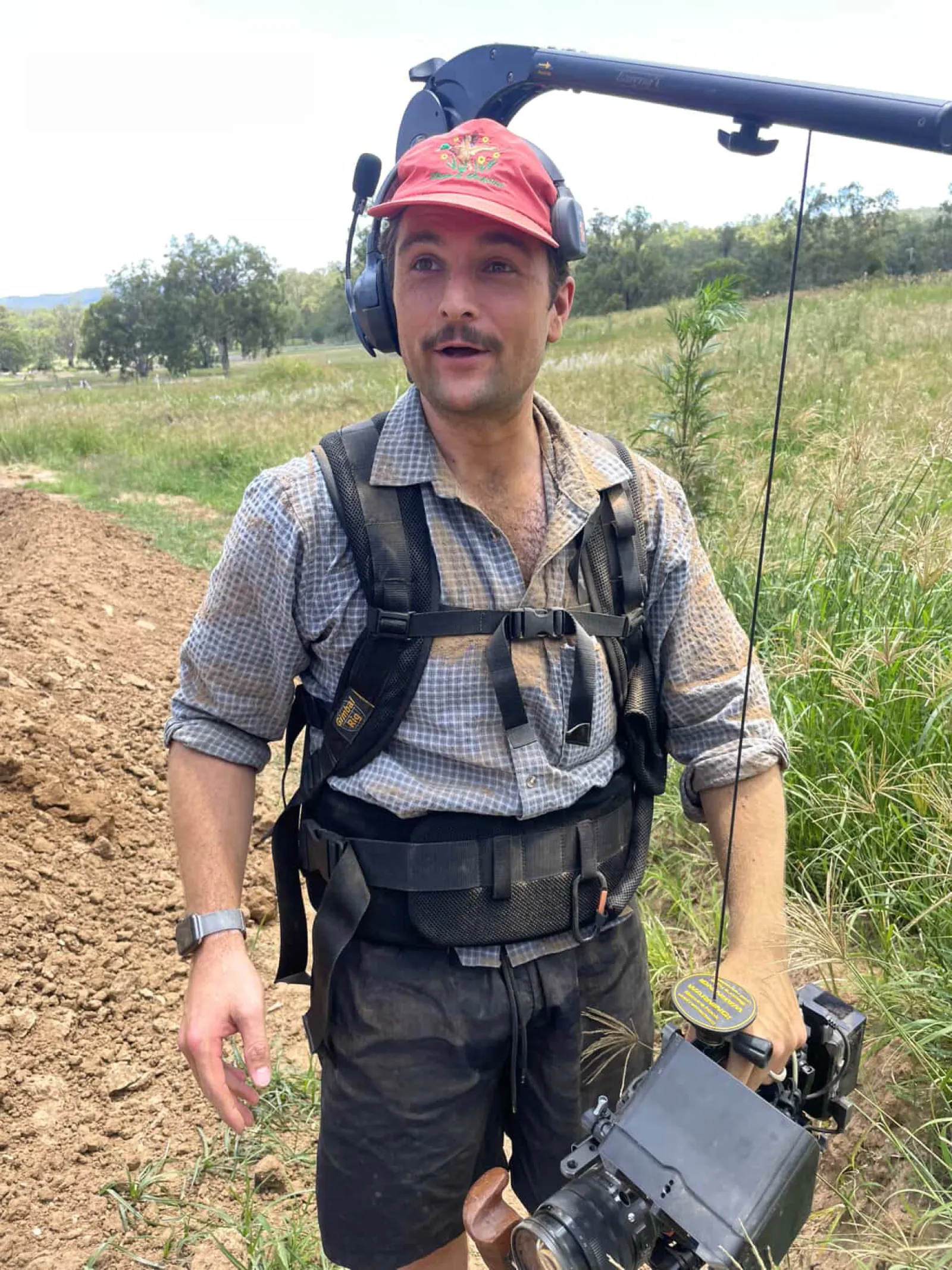 Matt getting sprayed with dirt while shooting the Maxxis commercial with ShareStory