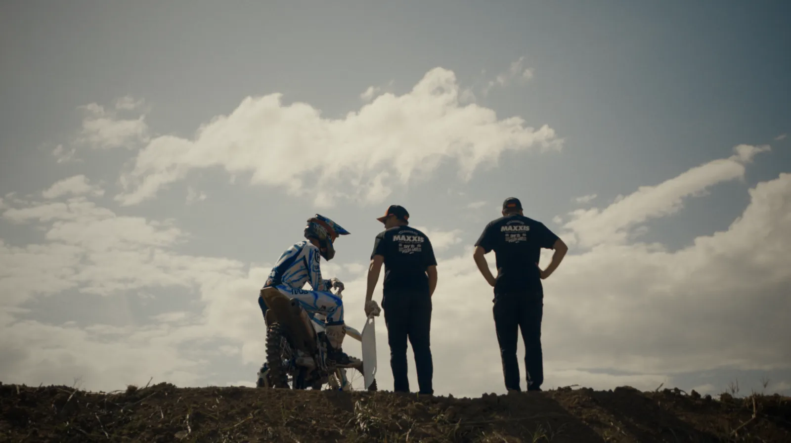 The Maxxis team on set, planning their next stunt on the QMP Race Track.