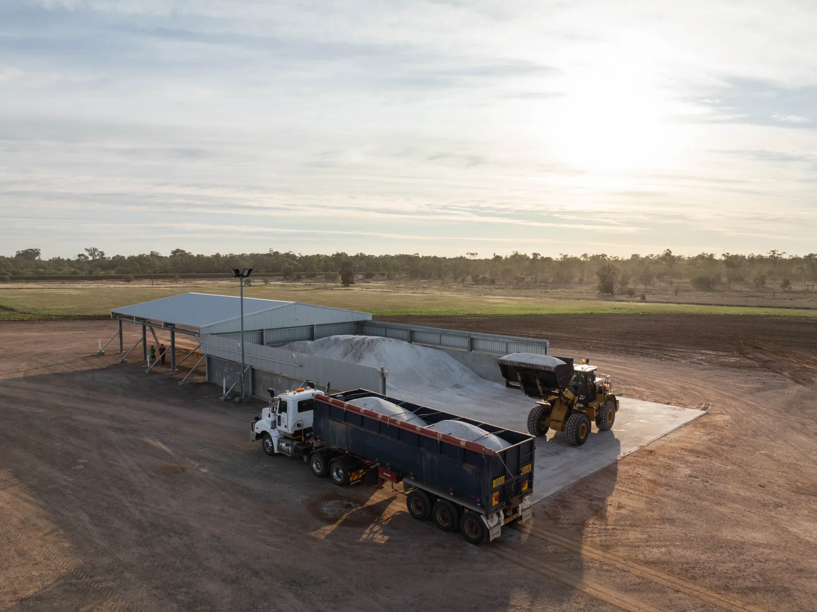 This R&F Steel Buildings design allows for The Anchorage team to load materials with heavy equipment, straight off the shed floor.