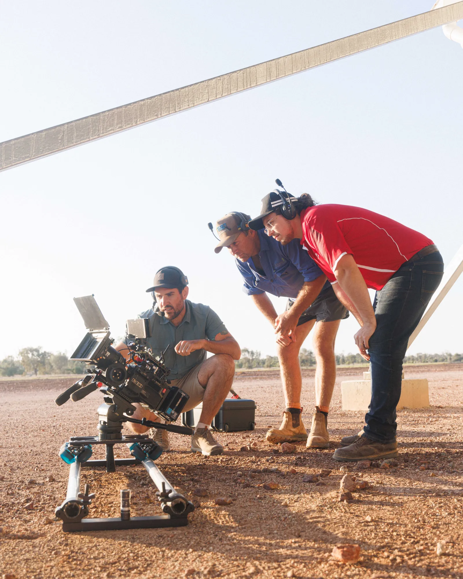 Morgan shows the clients from R&F Steel Buildings the shot before continuing at Cubbie Station.