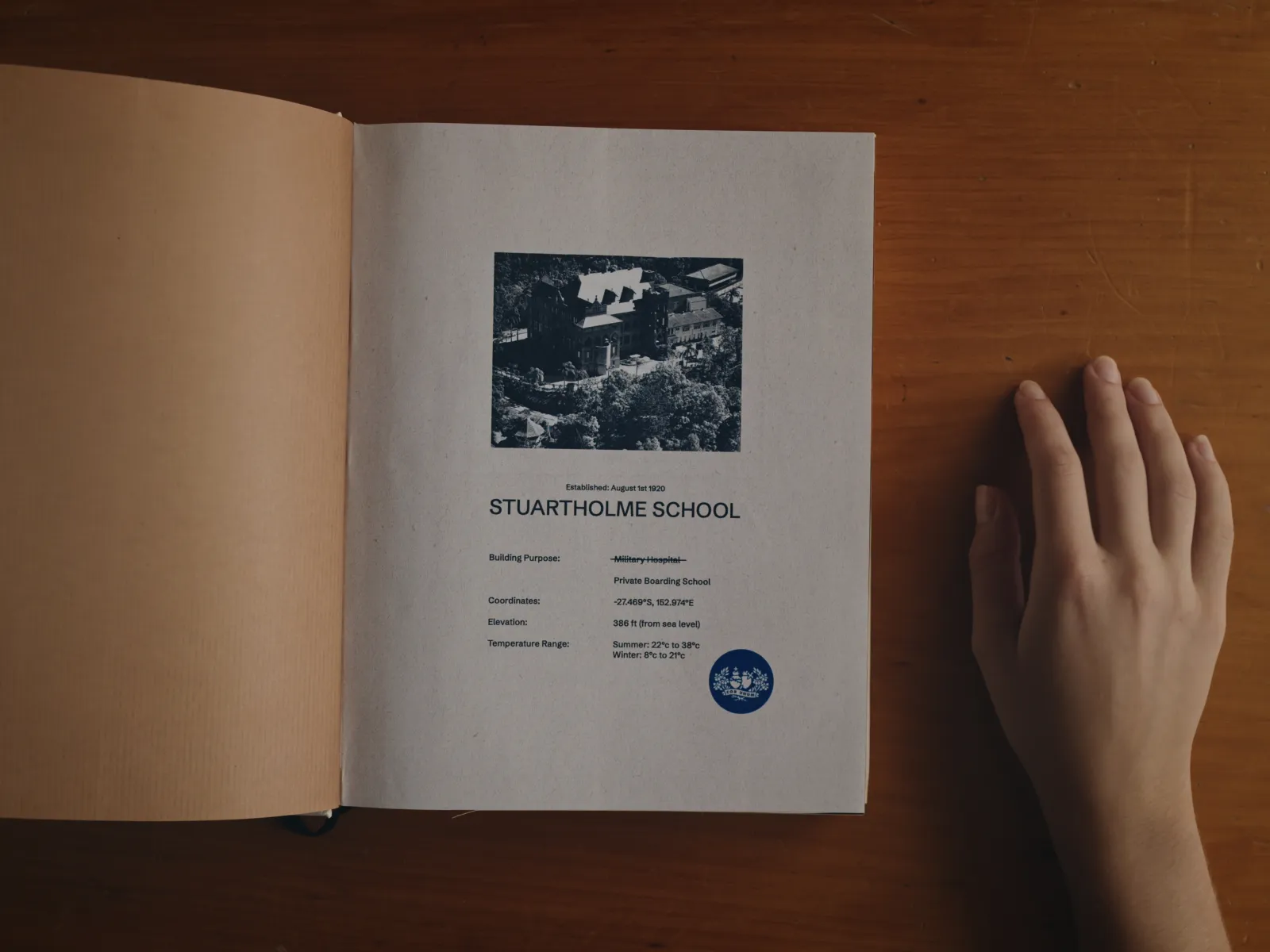 a Stuartholme student turns the page on a book about the school's long history.