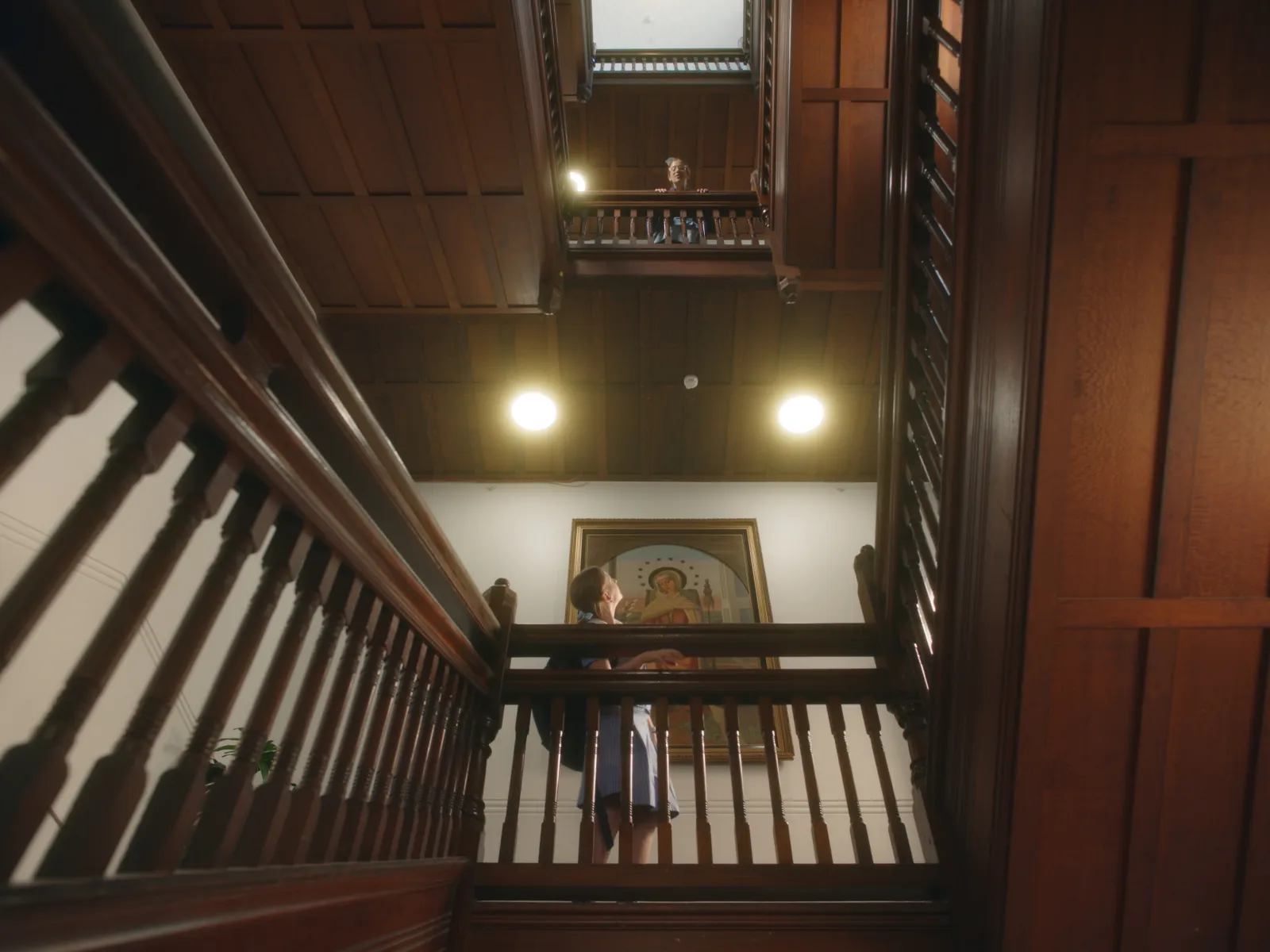 a wes anderson inspired frame from Stuartholme School's brand video including the amazing Renard stairs.
